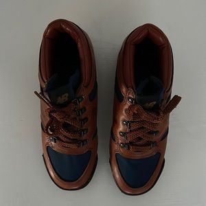New balance rainer boots size 7.5 men and 9.5 women